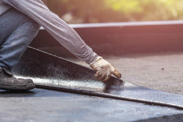 Professional Basement Waterproofing technician working in Bentonville, OH